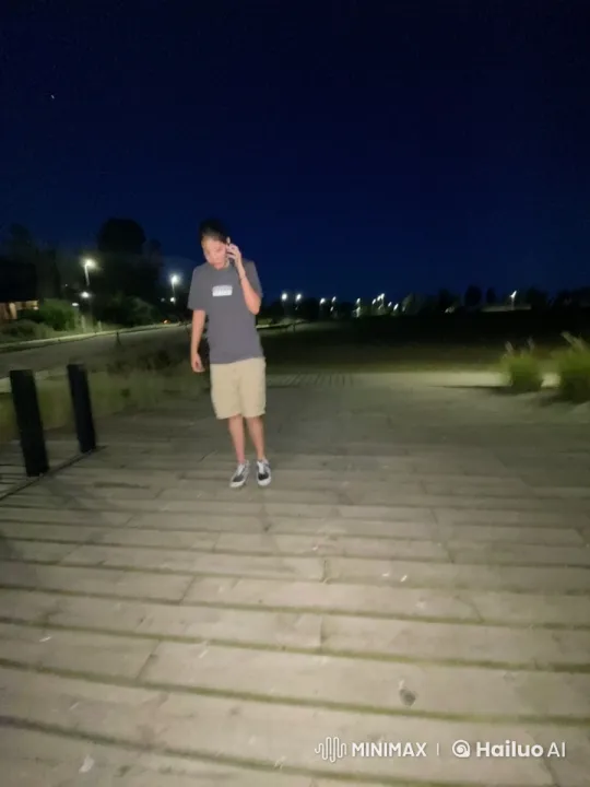 Intimate Nighttime Boardwalk Kiss Between Two Women – AI Generated Video | Hailuo AI