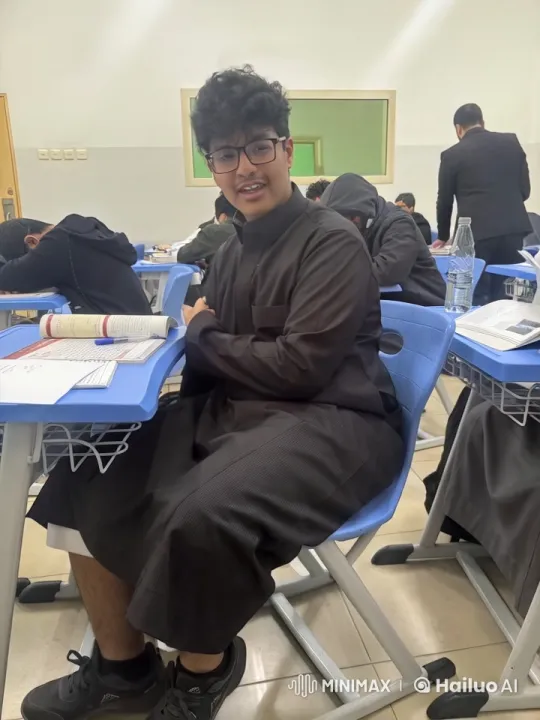 Traditional Attire Student Smokes Subtly in Quiet Classroom – AI Generated Video | Hailuo AI