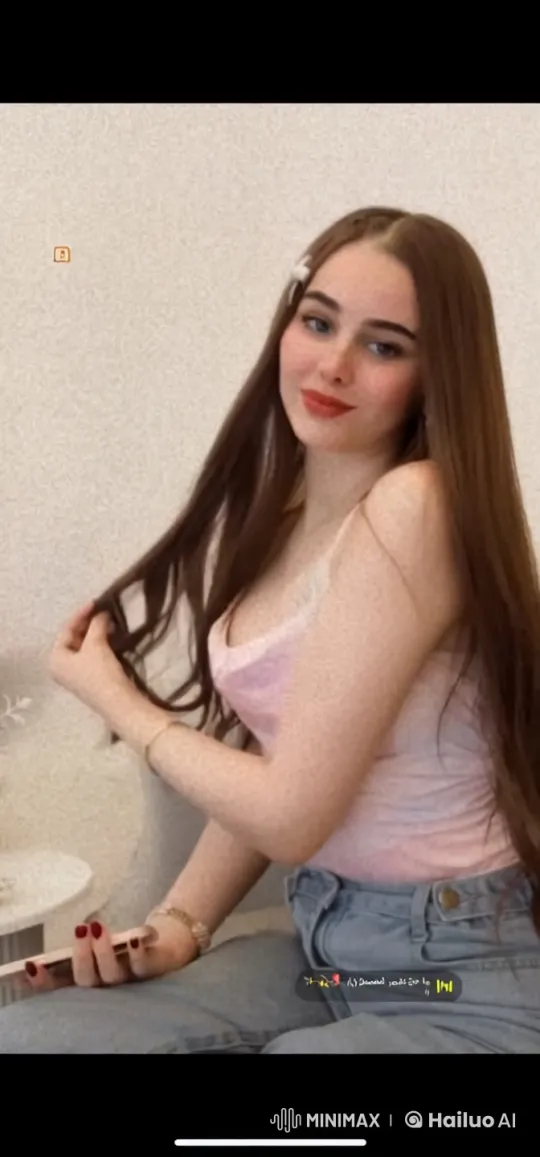 Woman Smoking, Adjusting Hair in Cozy Indoor Setting – AI Generated Video | Hailuo AI