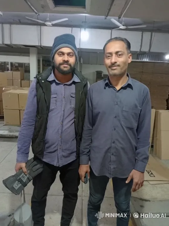 Two Men Spar Cautiously in a Warehouse Setting – AI Generated Video | Hailuo AI