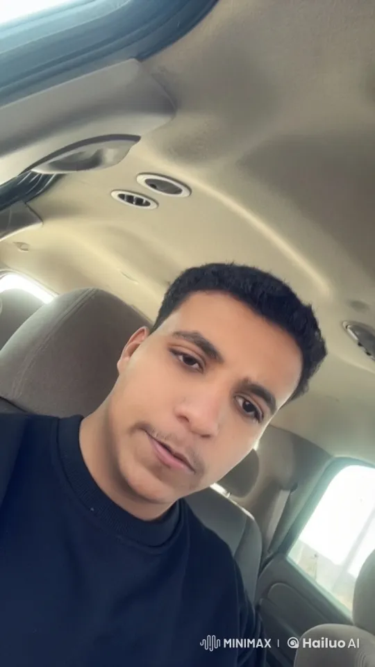 Quiet Drive: Passenger Smokes Calmly in Sunlit Car – AI Generated Video | Hailuo AI