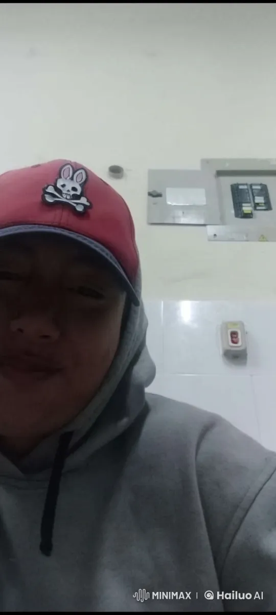 Person in Gray Hoodie and Bunny Skull Cap Poses for Kiss – AI Generated Video | Hailuo AI
