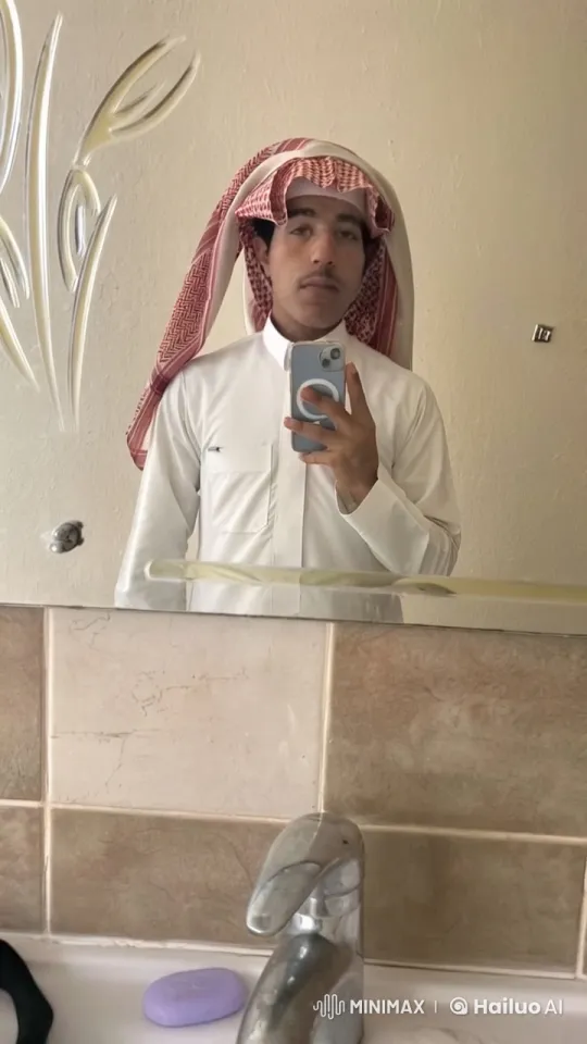 Young Man Reflects in Bathroom Mirror Smoking – AI Generated Video | Hailuo AI