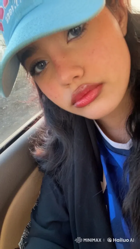 Young Woman Smoking in a Car with Soft Lighting – AI Generated Video | Hailuo AI