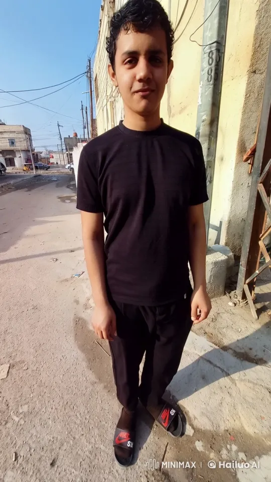 Young Person Smoking on Street in Casual Attire – AI Generated Video | Hailuo AI