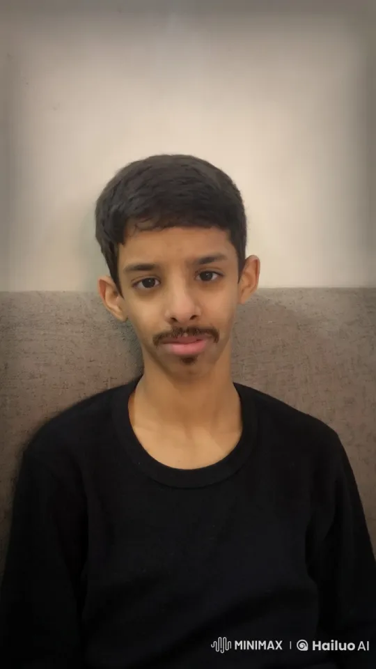 Young Person Calmly Smokes on Couch – AI Generated Video | Hailuo AI