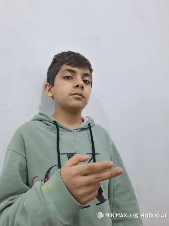 Young Person Mimics Smoking in Minimalist Setting – AI Generated Video | Hailuo AI