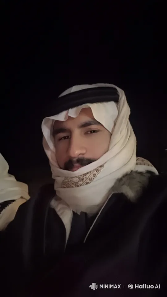 Traditional Headscarf: A Tranquil Moment with a Cigarette – AI Generated Video | Hailuo AI