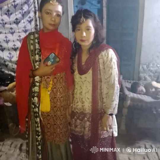 Intimate Moment Between Two Women in Traditional Attire – AI Generated Video | Hailuo AI