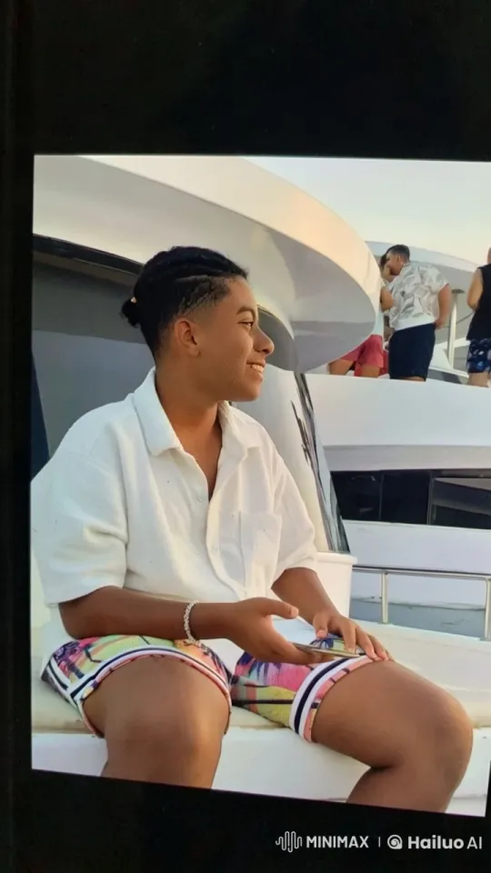 Young Person Relaxing on Boat with Cigarette – AI Generated Video | Hailuo AI