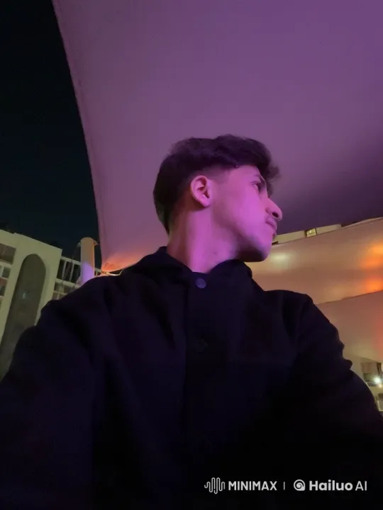 Urban Night: Smoky Figure Under Purple-Orange Lights – AI Generated Video | Hailuo AI