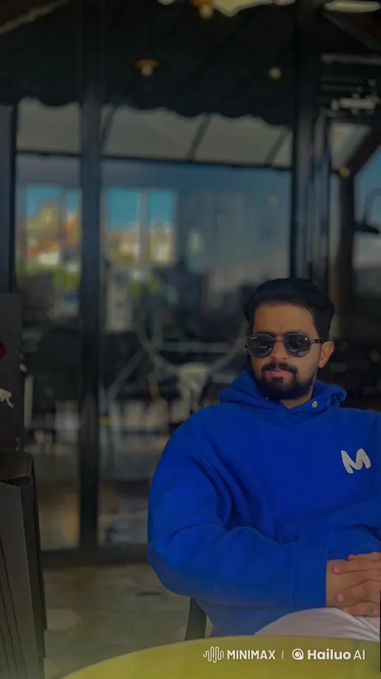 Person Smokes Cigarette in Outdoor Seating Area – AI Generated Video | Hailuo AI