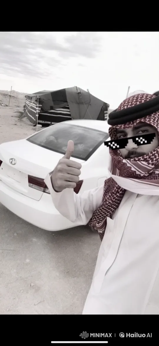 Man in Middle Eastern Attire Smokes in Desert Scene – AI Generated Video | Hailuo AI