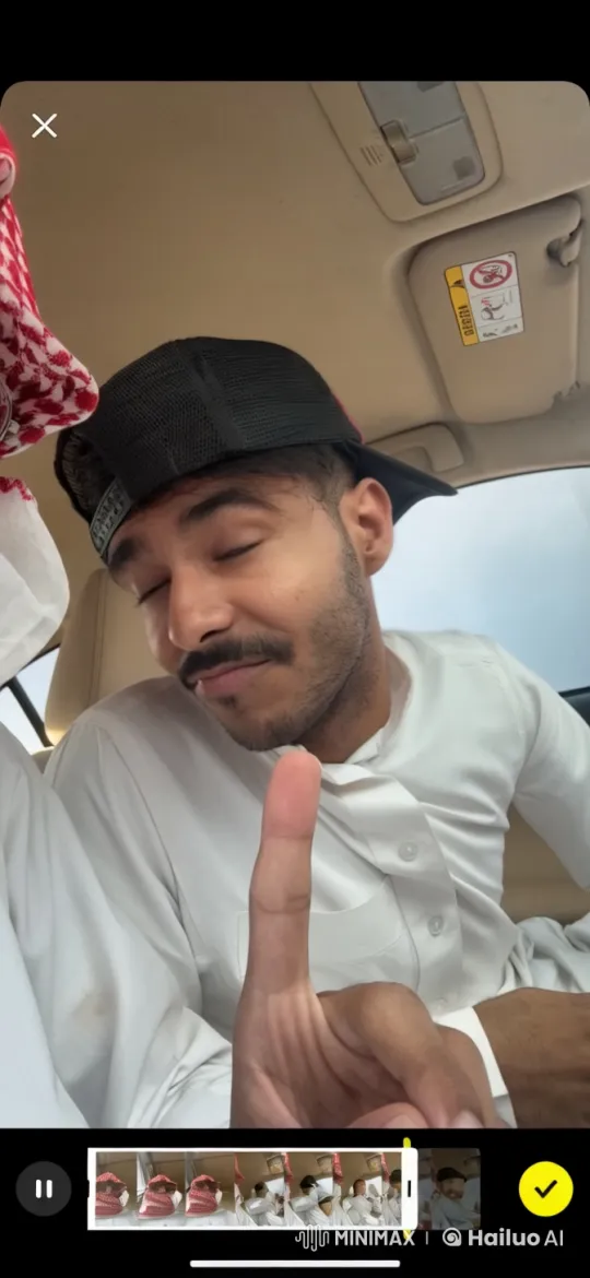 Traditional Attired Individuals Smoking in Car on Sunny Day – AI Generated Video | Hailuo AI