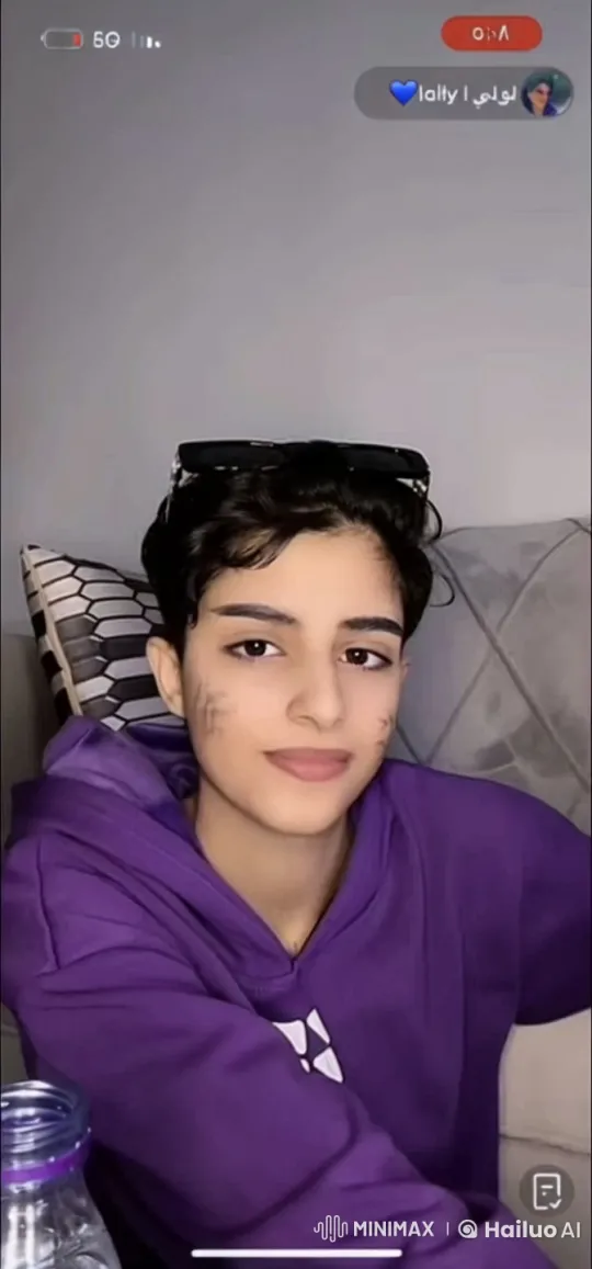 Relaxed Person Smoking on Couch with Geometric Pillow – AI Generated Video | Hailuo AI