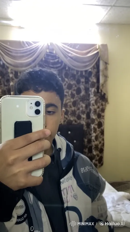 Selfie-Taking Person in Cozy Room with Live2D Animation – AI Generated Video | Hailuo AI