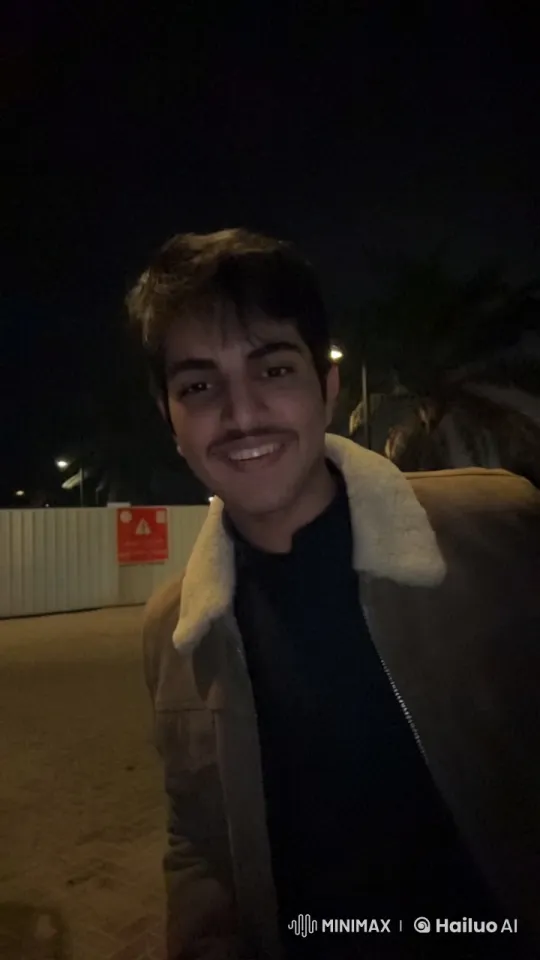 Nighttime Stroll: Young Man Reflects by Streetlight – AI Generated Video | Hailuo AI