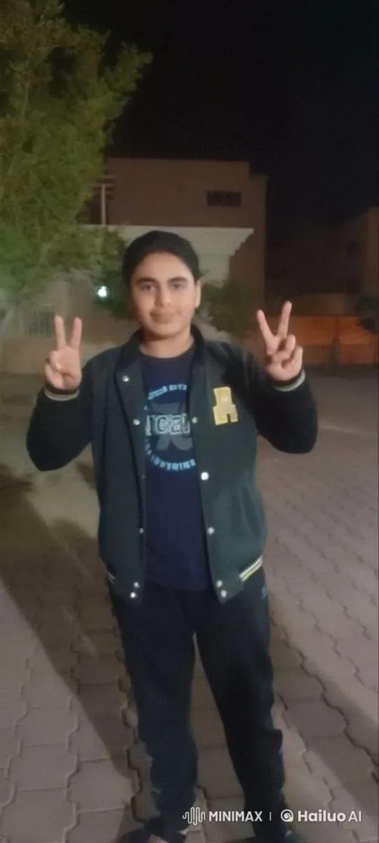 Young Person Enjoying a Cigarette Outside at Night – AI Generated Video | Hailuo AI