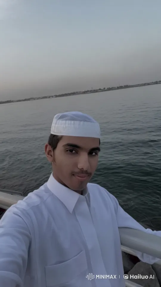 Man Smoking by Water at Twilight – AI Generated Video | Hailuo AI