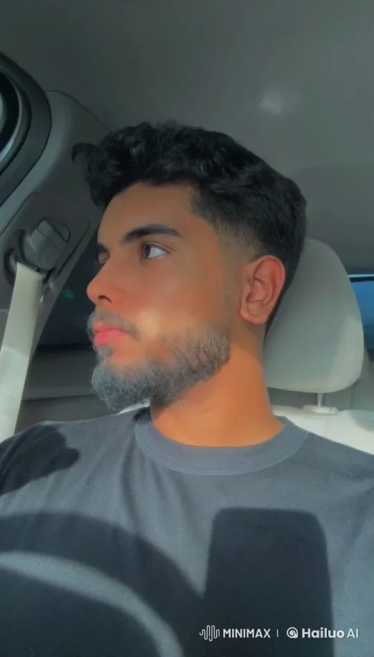 Man Smoking in Stationary Car with Sunlight Effects – AI Generated Video | Hailuo AI