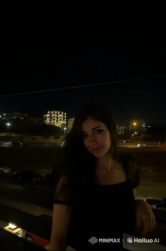 Nighttime Reflection: Woman Smokes on Balcony – AI Generated Video | Hailuo AI