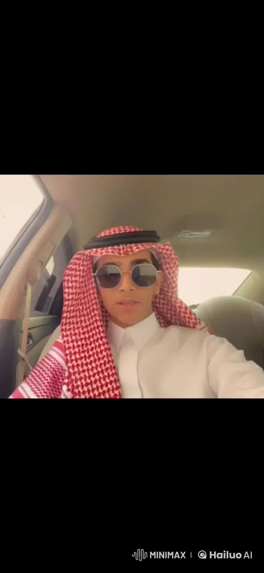 Man in Traditional Attire Smokes Calmly in Car – AI Generated Video | Hailuo AI