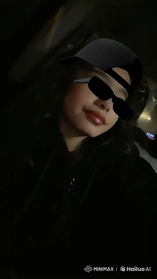 Nighttime Reflections: A Person Smoking in a Dim Car – AI Generated Video | Hailuo AI