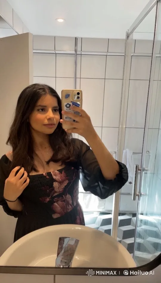 Woman Taking Mirror Selfie with Cigarette in Stylish Bathroom – AI Generated Video | Hailuo AI