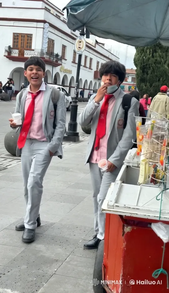 Boys in School Uniforms Share Kiss on Lively Street – AI Generated Video | Hailuo AI