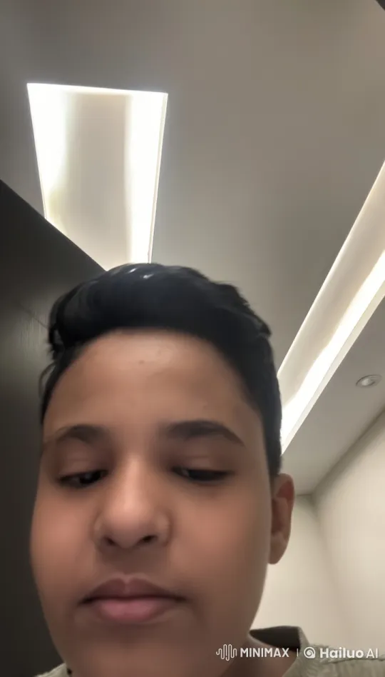 Person Smoking in Modern Indoor Setting with Ambient Lighting – AI Generated Video | Hailuo AI