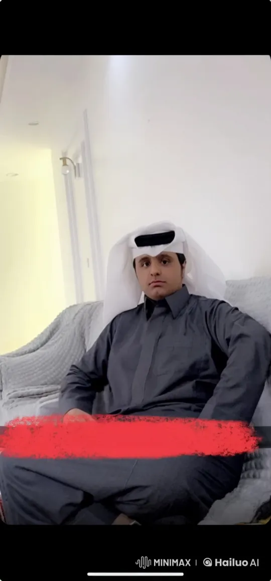 Traditional Man Smokes Leisurely in Modern Living Room – AI Generated Video | Hailuo AI