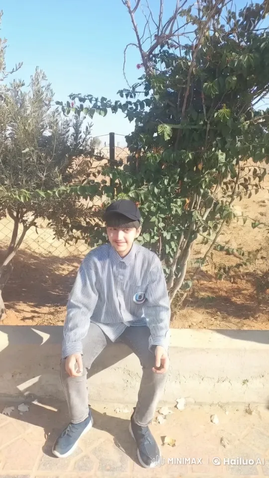 Young Man Smoking in Peaceful Garden Setting – AI Generated Video | Hailuo AI