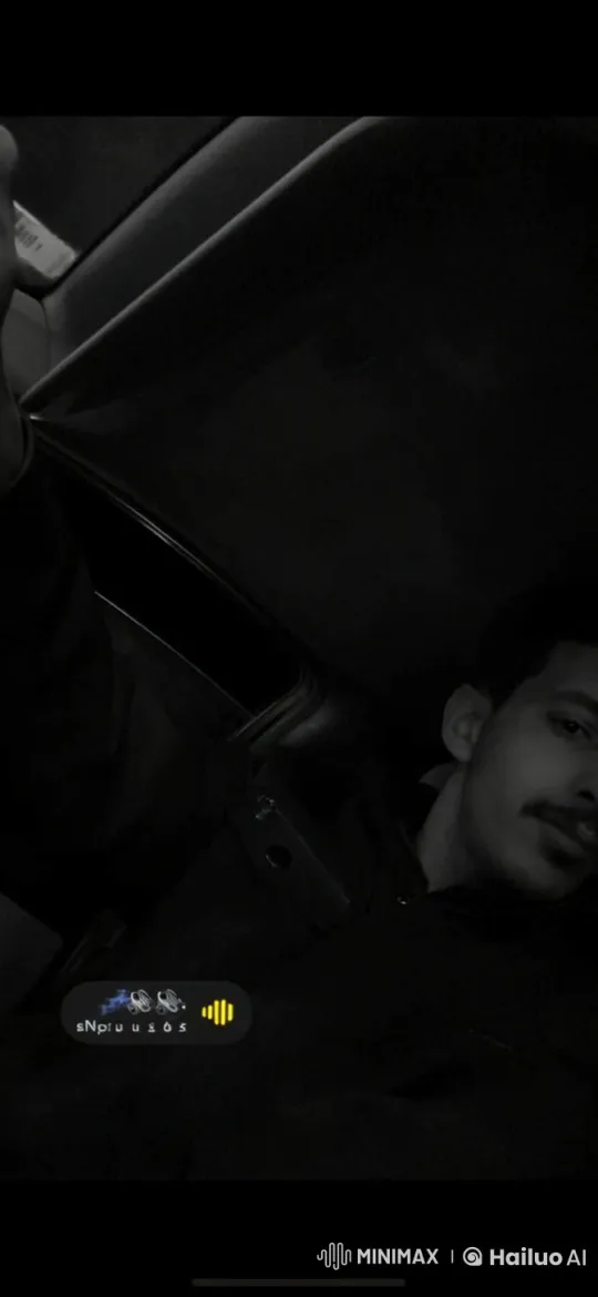 Person Smoking in Dark Car: A Contemplative Scene – AI Generated Video | Hailuo AI