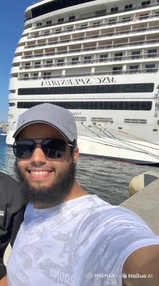 Man Smokes by Docked MSC Splendida on Sunny Day – AI Generated Video | Hailuo AI