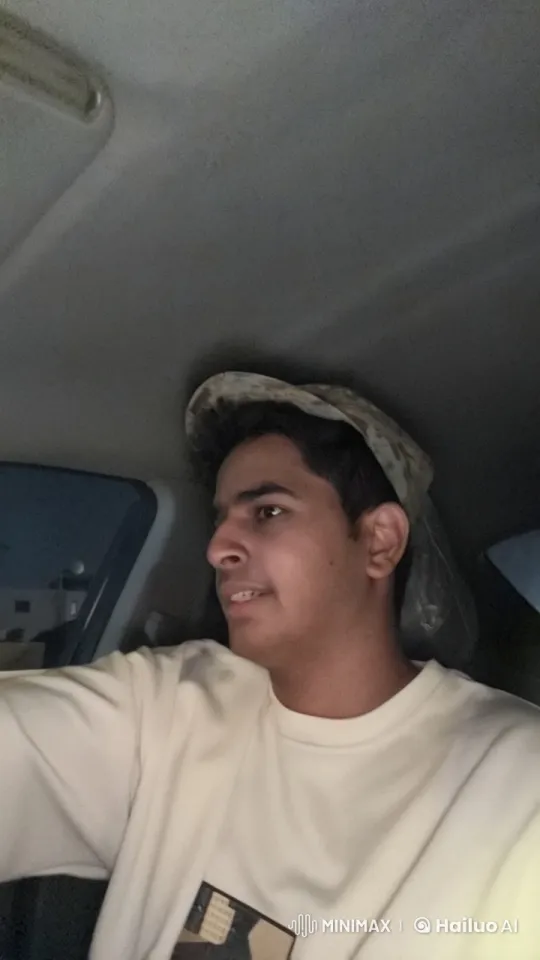 Young Man Smoking in Dimly Lit Car Interior – AI Generated Video | Hailuo AI
