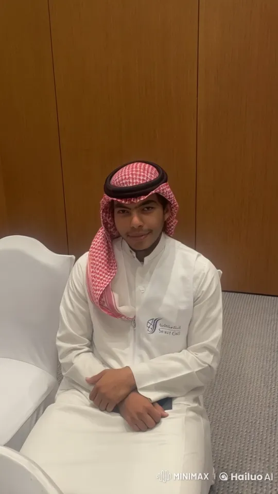 Man Smoking Cigarette in White Thobe with 'Smart Grid' Logo – AI Generated Video | Hailuo AI