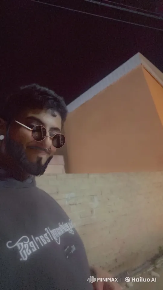 Nighttime Smoking Scene with Hooded Person – AI Generated Video | Hailuo AI
