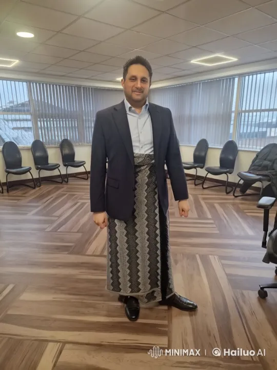 Dancing Man Blends Tradition and Modernity in Office Setting – AI Generated Video | Hailuo AI