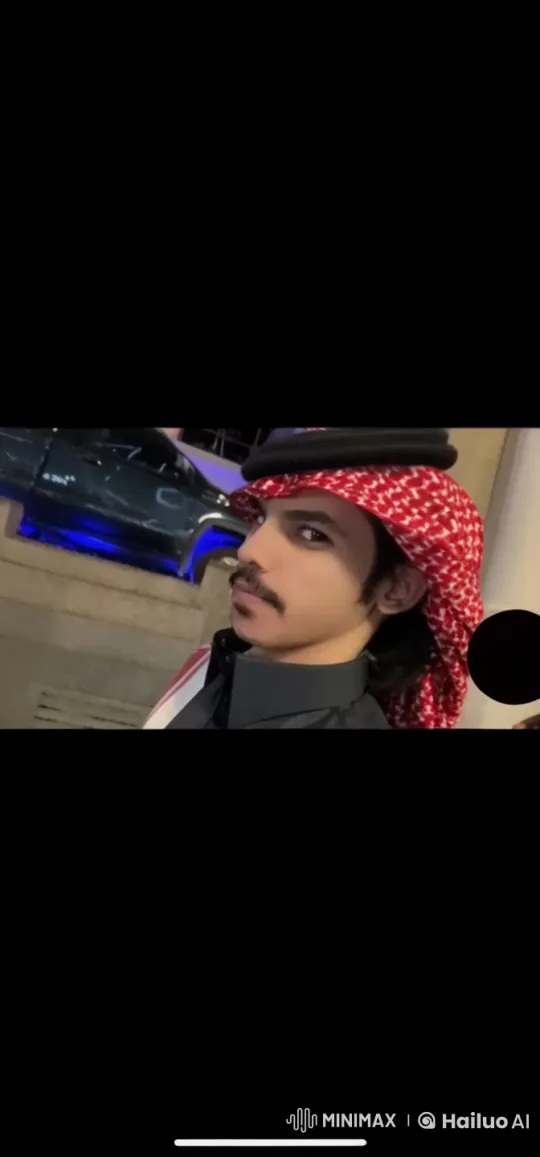 Traditional Attired Person Smoking by Illuminated Car – AI Generated Video | Hailuo AI
