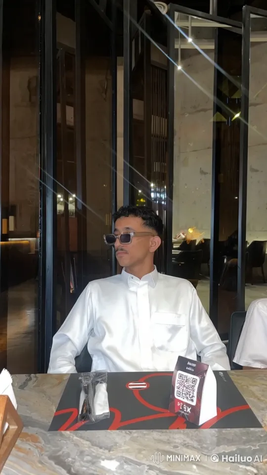 Man Smoking at Stylish Restaurant Table – AI Generated Video | Hailuo AI