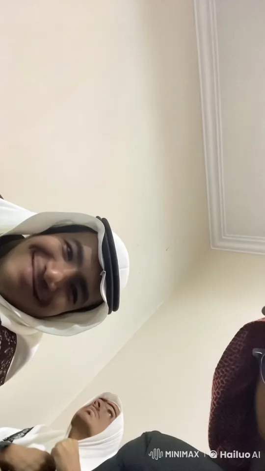 Traditional Attire Individuals Engage in Casual Conversation – AI Generated Video | Hailuo AI