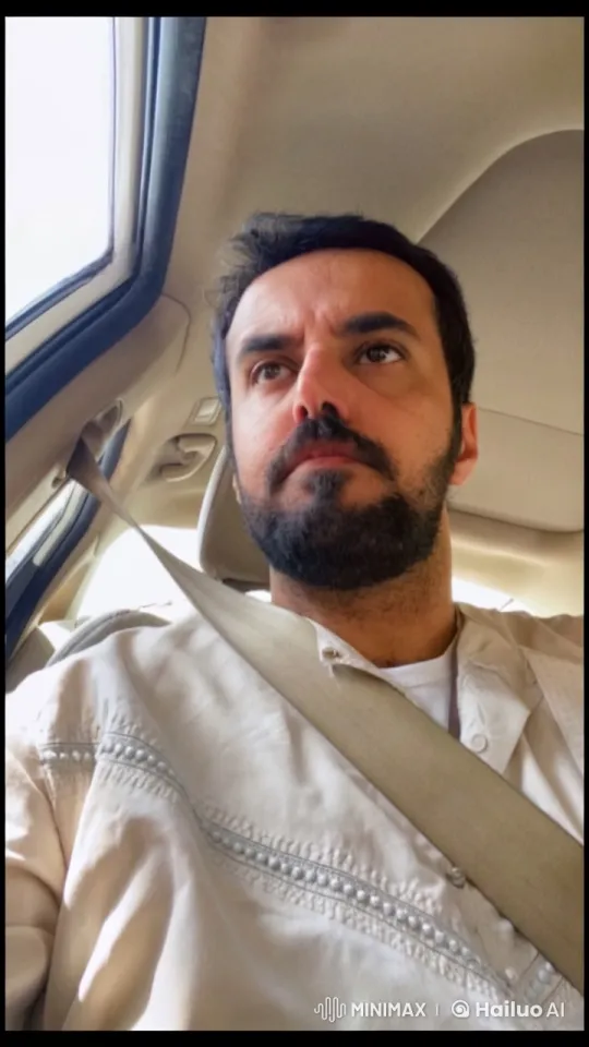 Man Smoking in Car, Observing Scenery – AI Generated Video | Hailuo AI