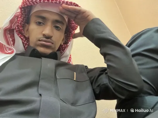 Man in Keffiyeh Smokes Calmly, Adjusts Headscarf – AI Generated Video | Hailuo AI