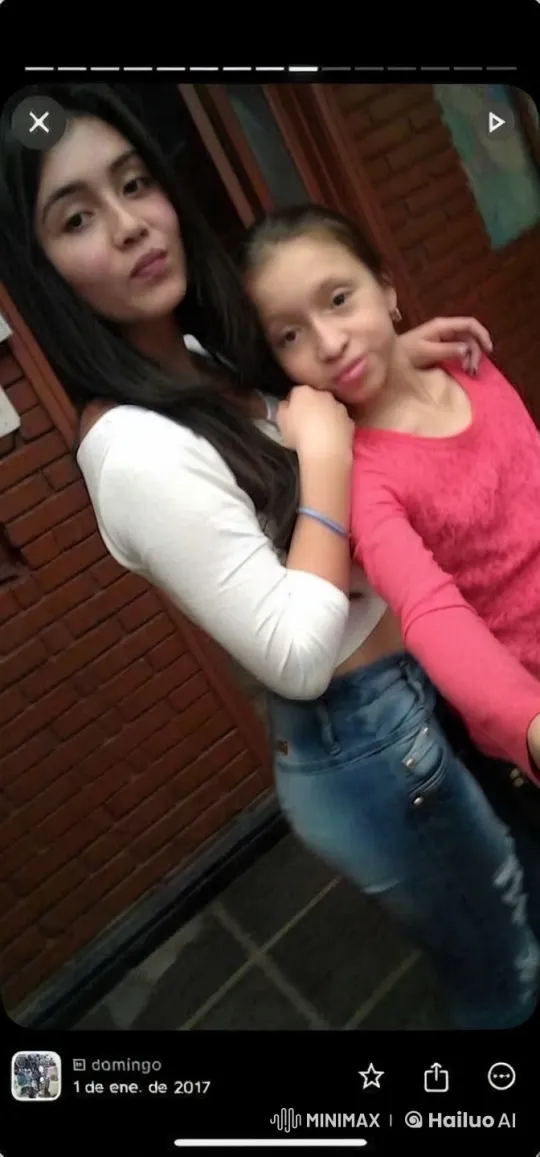 Girls Playfully Tussle Over Hair in Cozy Setting – AI Generated Video | Hailuo AI