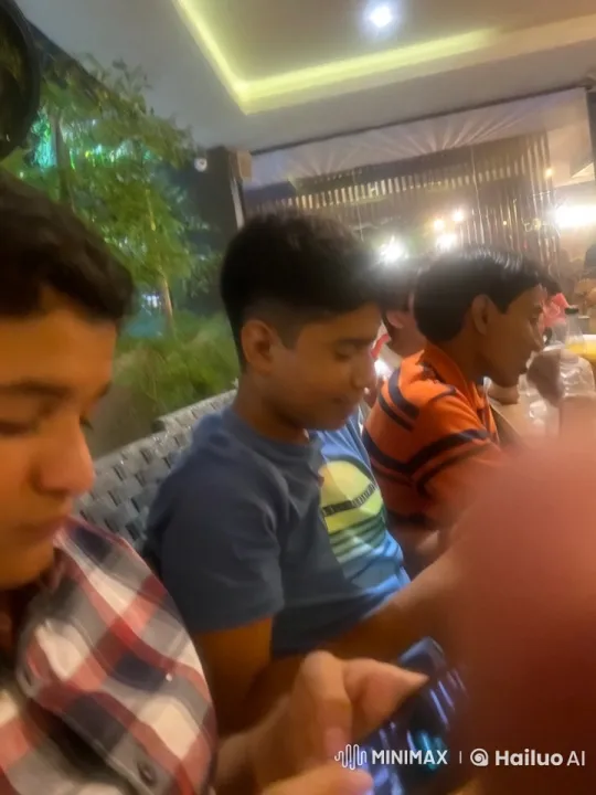 Affectionate Moment at a Lively Restaurant Table – AI Generated Video | Hailuo AI