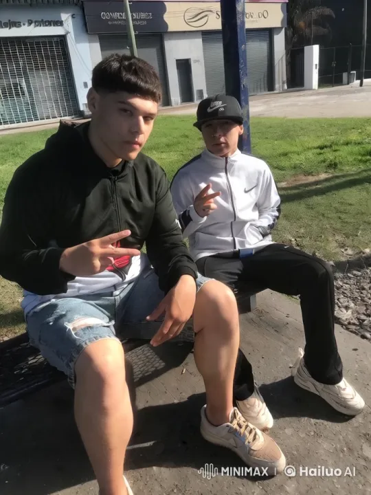 Two Friends and Messi Share a Casual Moment on a Bench – AI Generated Video | Hailuo AI