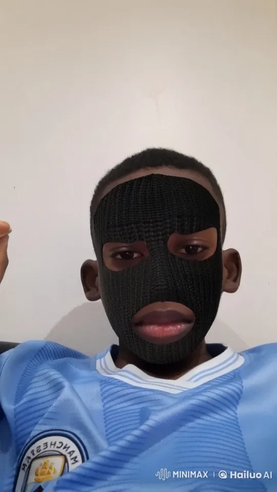 Individual Mimics Smoking in Manchester City Jersey – AI Generated Video | Hailuo AI