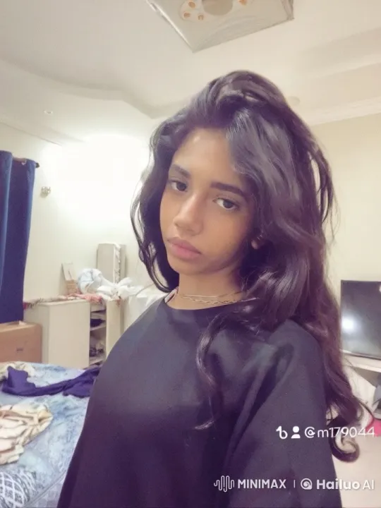 Woman Smoking in Bedroom with Unmade Bed – AI Generated Video | Hailuo AI