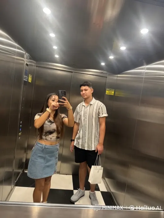 Young Couple Playfully Fights in Elevator – AI Generated Video | Hailuo AI