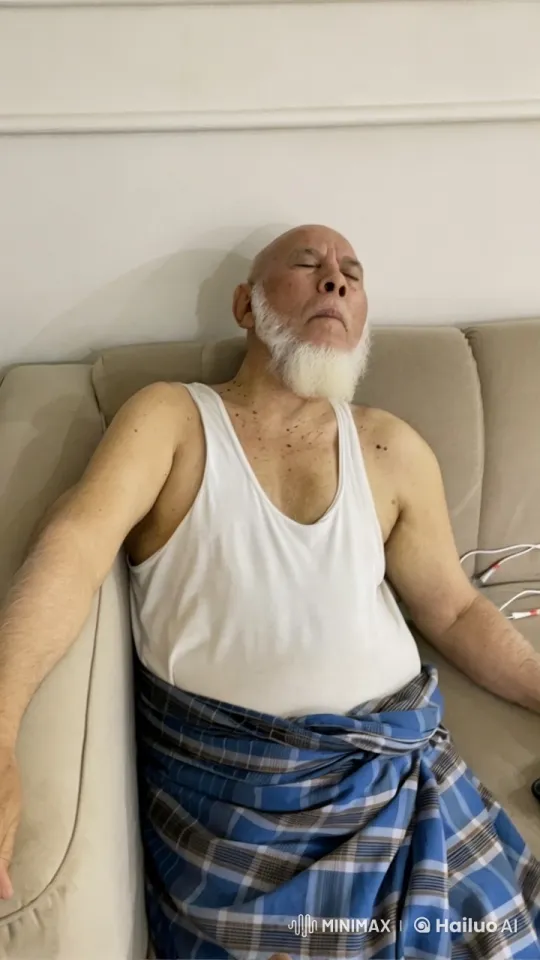 Elderly Man Smoking on Sofa in Serene Setting – AI Generated Video | Hailuo AI